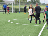 Laatste training S.K.N.W.K. JO11-1JM (partijtje tegen de ouders) van maandag 27 mei 2024 (103/137)